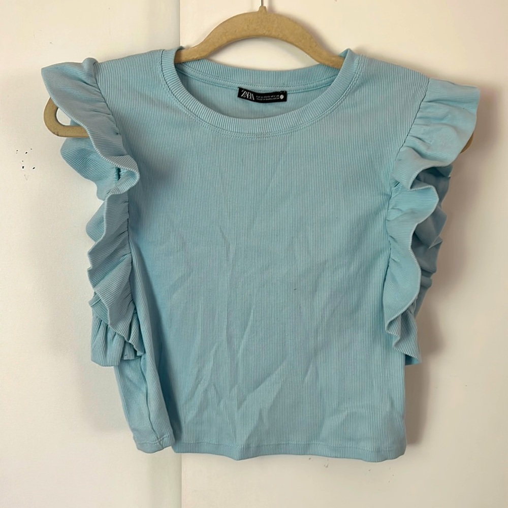 Blue ruffle top